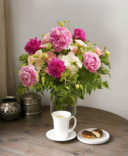 At give en buket pæoner